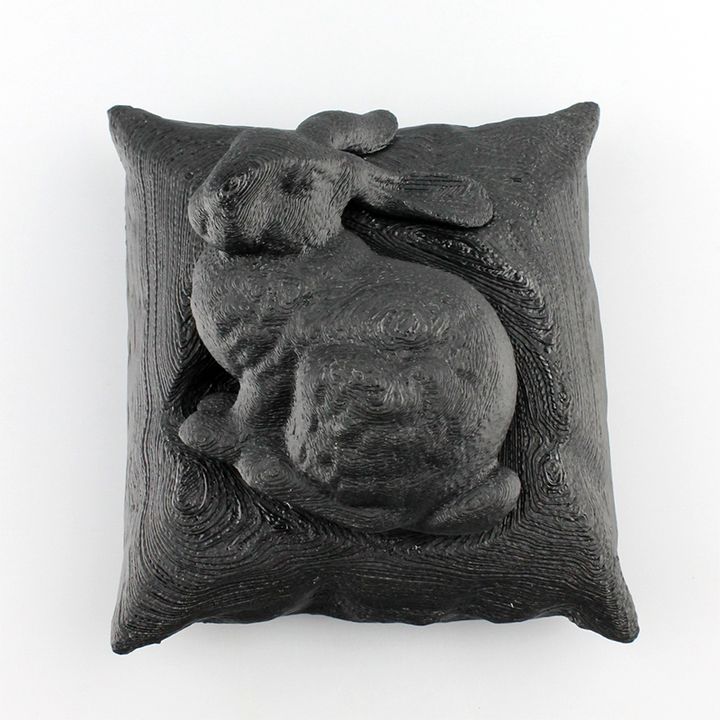 Stanford bunny resting on a pillow image