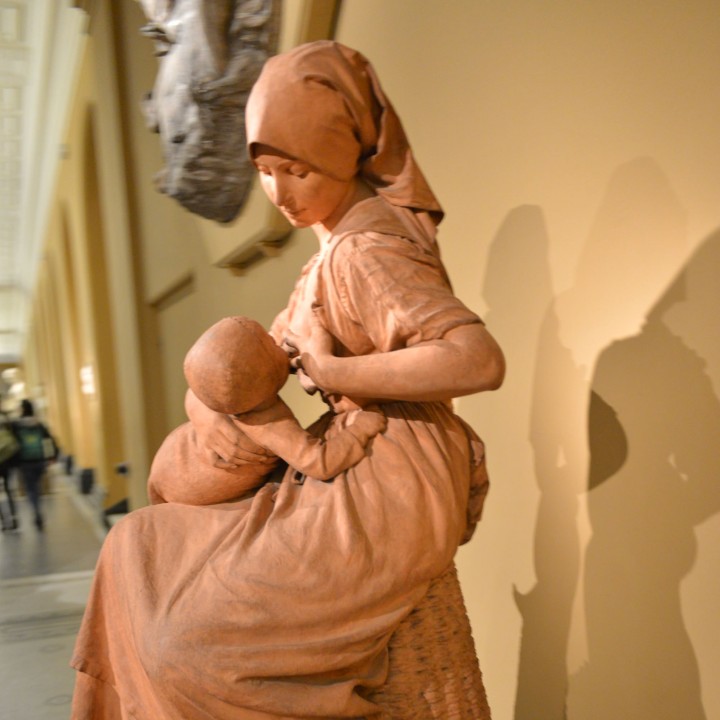 Peasant Nursing a Baby image