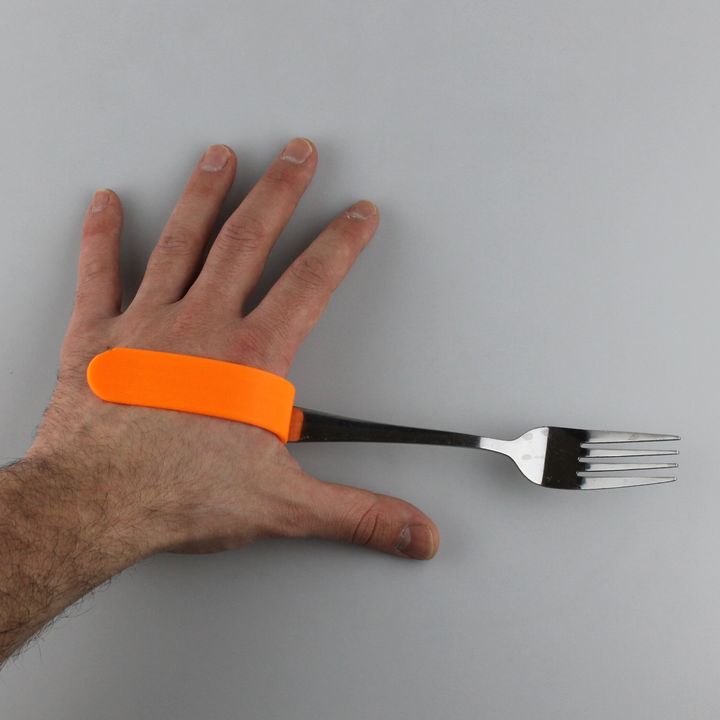 Fork and spoon support for person with disabilities image