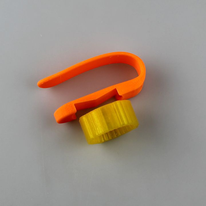 plastic bottle opener for hand support image