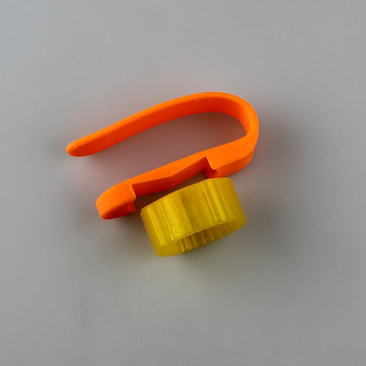 3D Printable plastic bottle opener for hand support by Luca Parmegiani