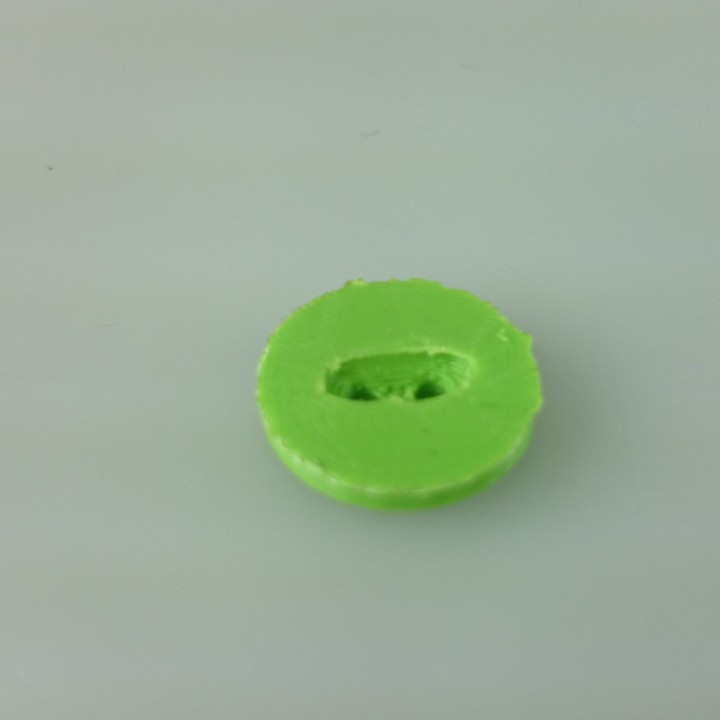 Button for your outfits with elliptical hole at top image