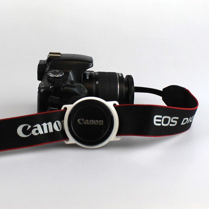 Lens cap holder for 58mm diameter lens image