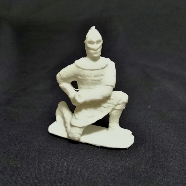 A seated army soldier image