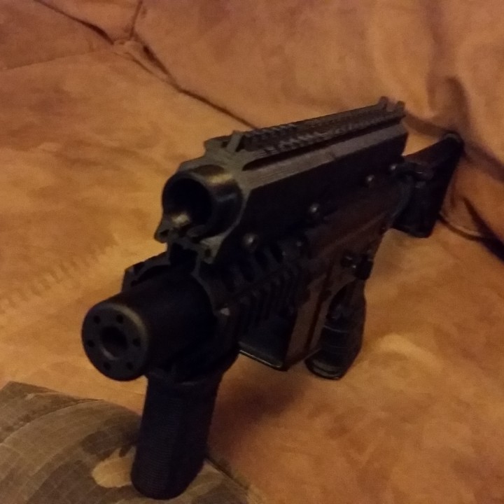 Airsoft M4 pistol rail riser and battery holder image