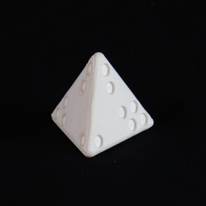 Four-sided pyramidal dice image