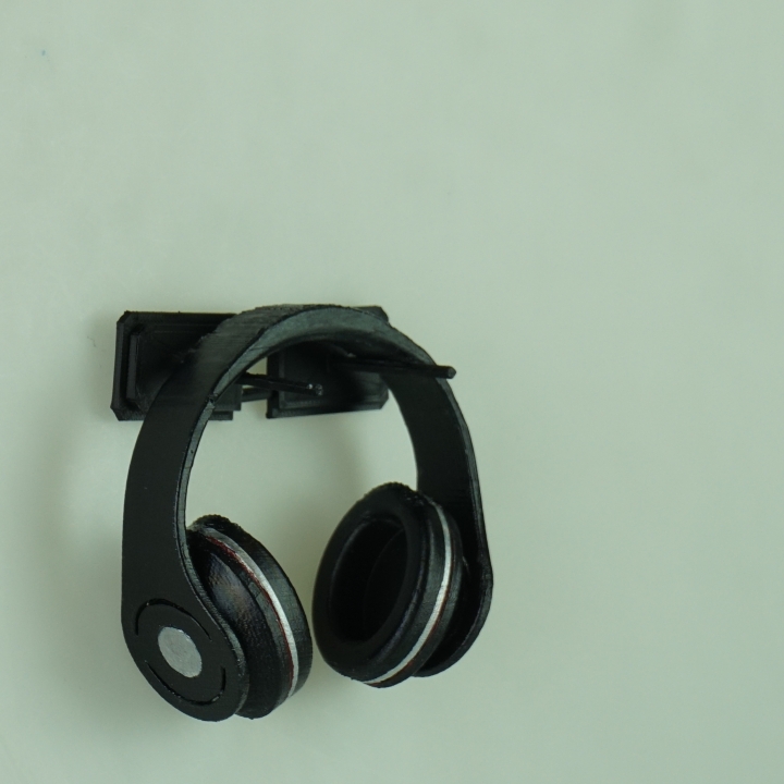 Wall-mounted headphone holder image