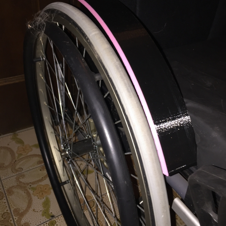 Custom mudguard for the Invacare Action 4 wheelchair. image