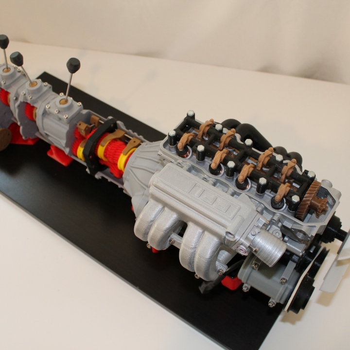 Complete working model, 4 cylinder engine, transmission, and transfer case. Educational Toy image