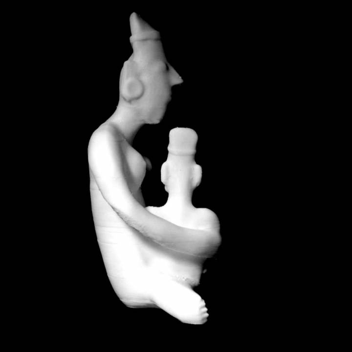 Pottery figure of a woman holding a child at The British Museum, London image
