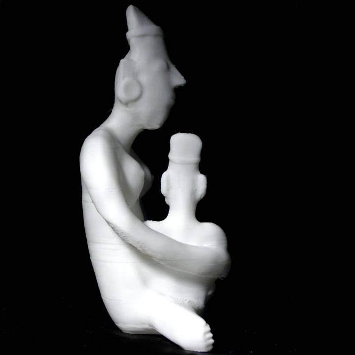 Pottery figure of a woman holding a child at The British Museum, London image