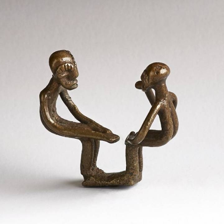 Gold weight in the form of a two standing male figures at The British Museum, London image