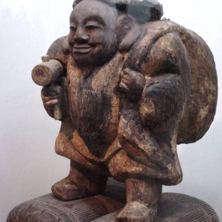 Statue of the lucky god Daikokuten at The British Museum, London image