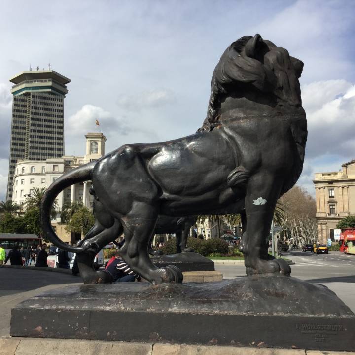 Lion at the base of the Columbus Monument in Barcelona, Spain image