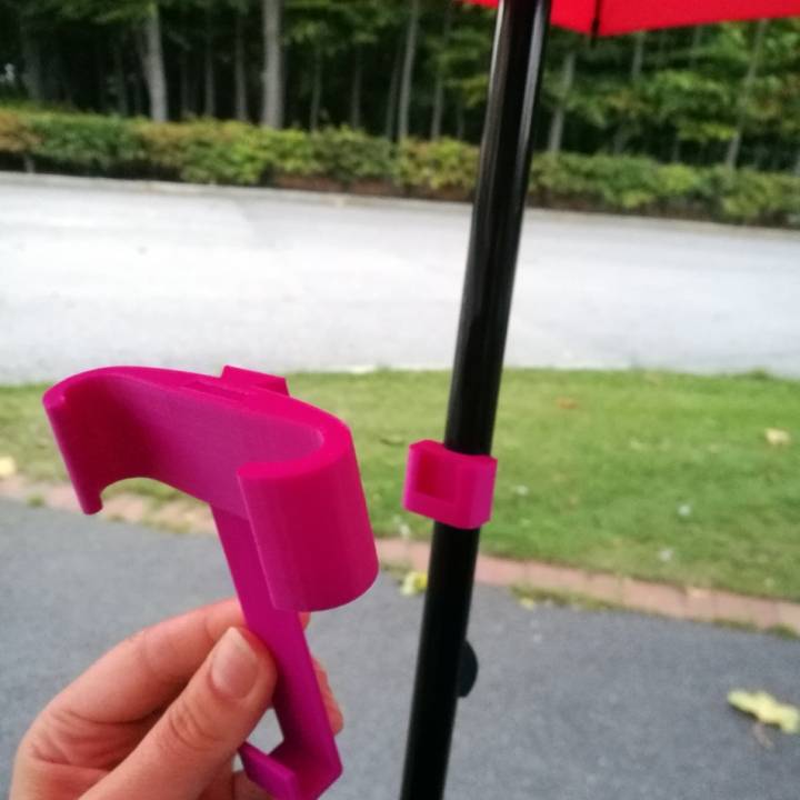 Universal phone holder for an umbrella image
