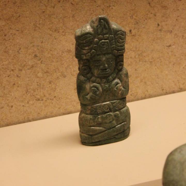 Jade Bar Pectoral and Jade Figurine of a Seated Ruler image