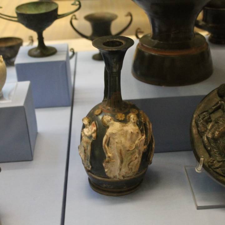 Oil flask with applied reliefs image