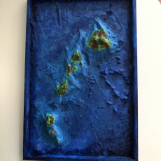 Picture of print of Hawaiian Islands with seafloor
