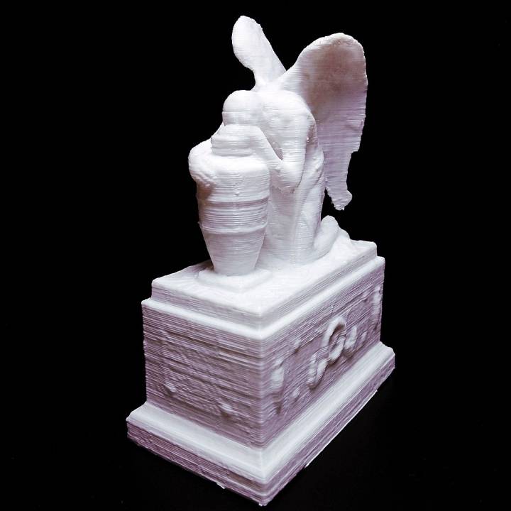 Gravestone Depicting Grieving Angel image