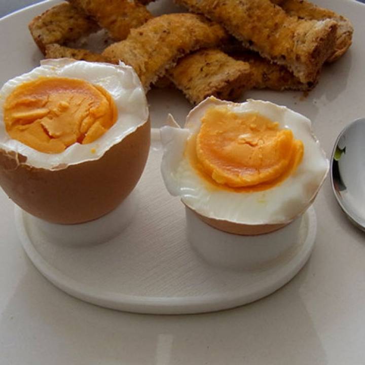 Boiled Egg Server - Neatly Holds Both Parts Of A Cut Boiled Egg While It's Being Eaten. image