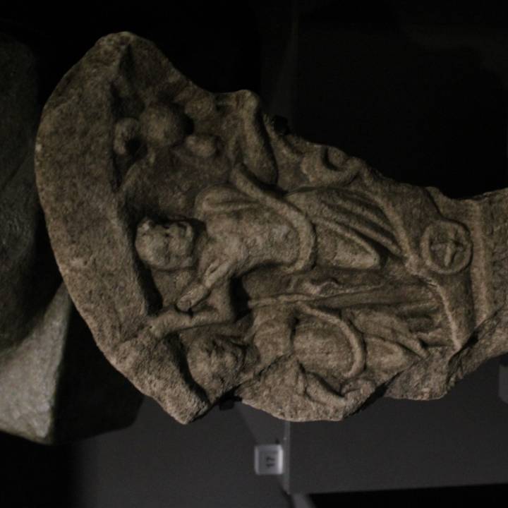 Marble relief fragment depicting Zeus and Era riding a chariot image