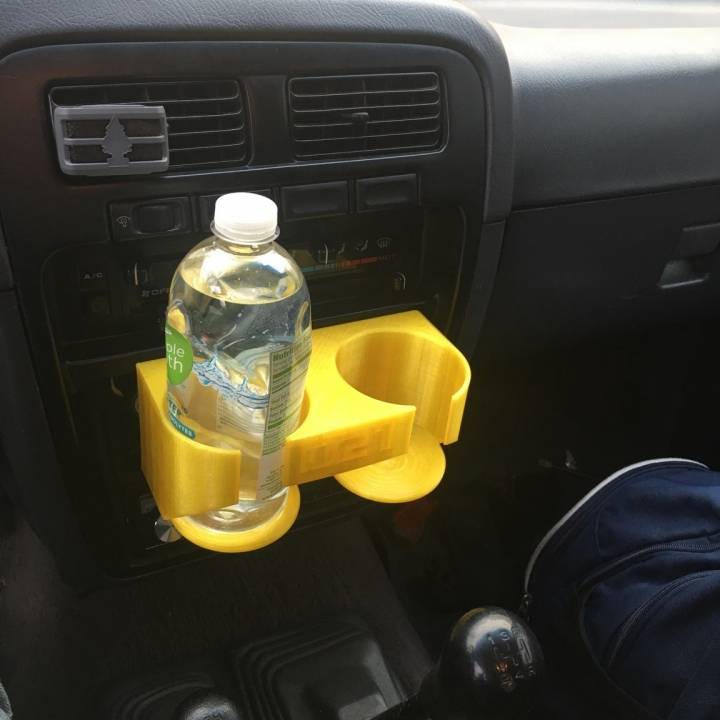 3D Printable 94 Nissan Hardbody Cup Holder/Coin Tray by Carter Schunk