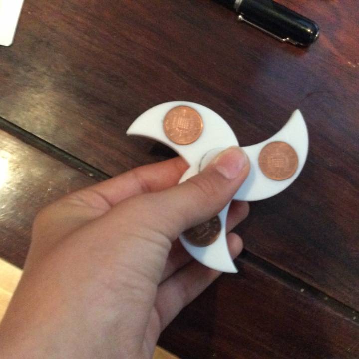 UK and US penny fidget spinner image