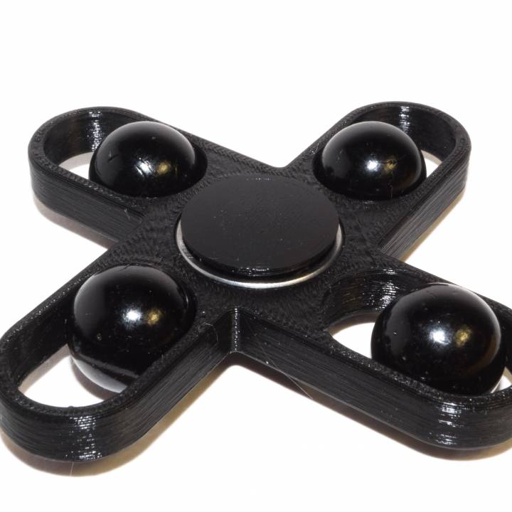 Hand spinner with moving balls image