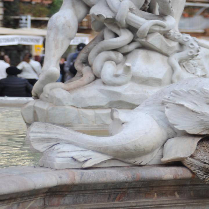 Fountain of Neptune, Fish With Cherub image