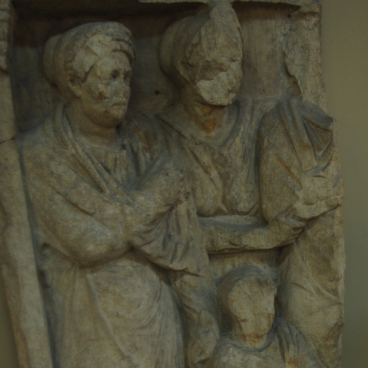 Gravestone fragment with family scene image