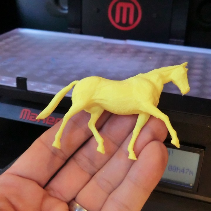 3D-printed toy horse figure (two halves) image