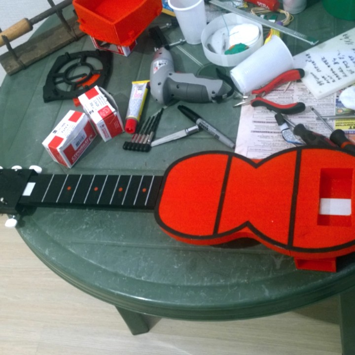 Travel guitar with built-in Amp and Speaker image
