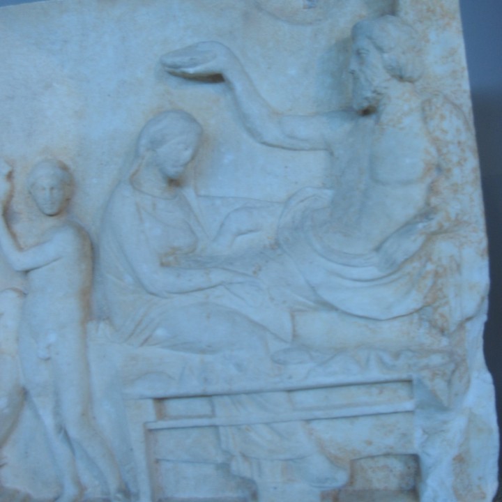 Votive relief showing a "funerary banquet" image