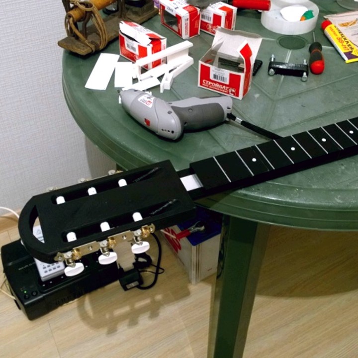 Acoustic guitar by Inayat Khan. image