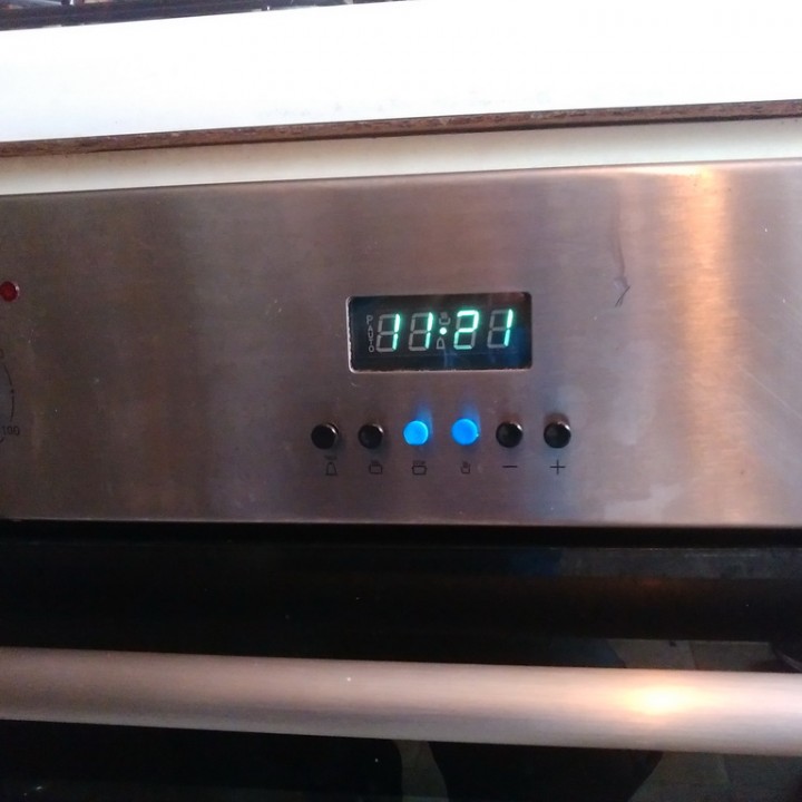 beko cooker clock button image