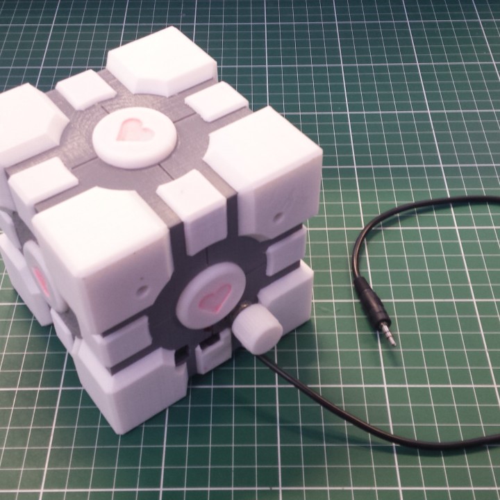 3D Printable Companion Cube Speaker Box or a detailed model of a ...