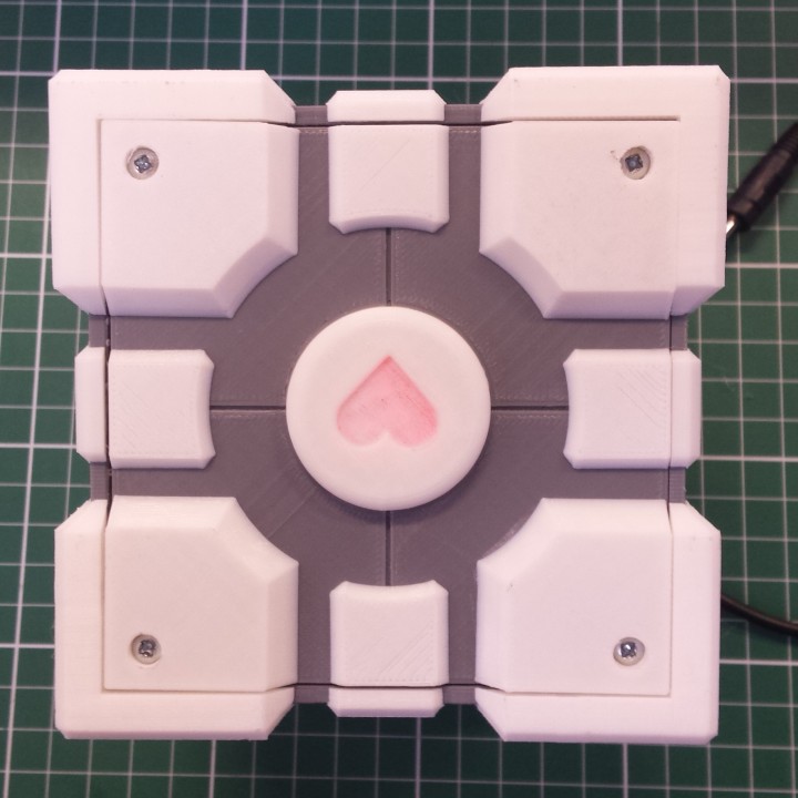 3D Printable Companion Cube Speaker Box or a detailed model of a ...