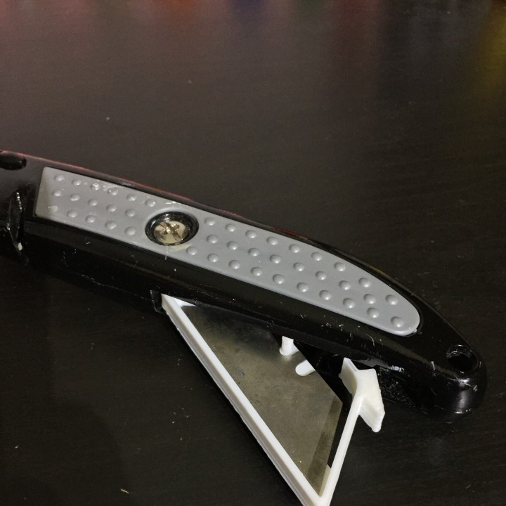 Blade holder for a Retractable Trimming Knife image
