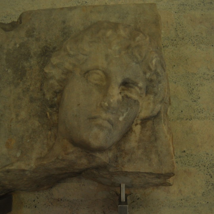 Mourning girl on relief image