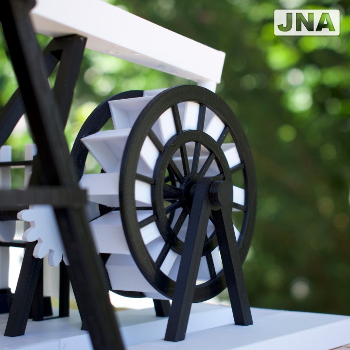 Water wheel with drink can water supply tank image