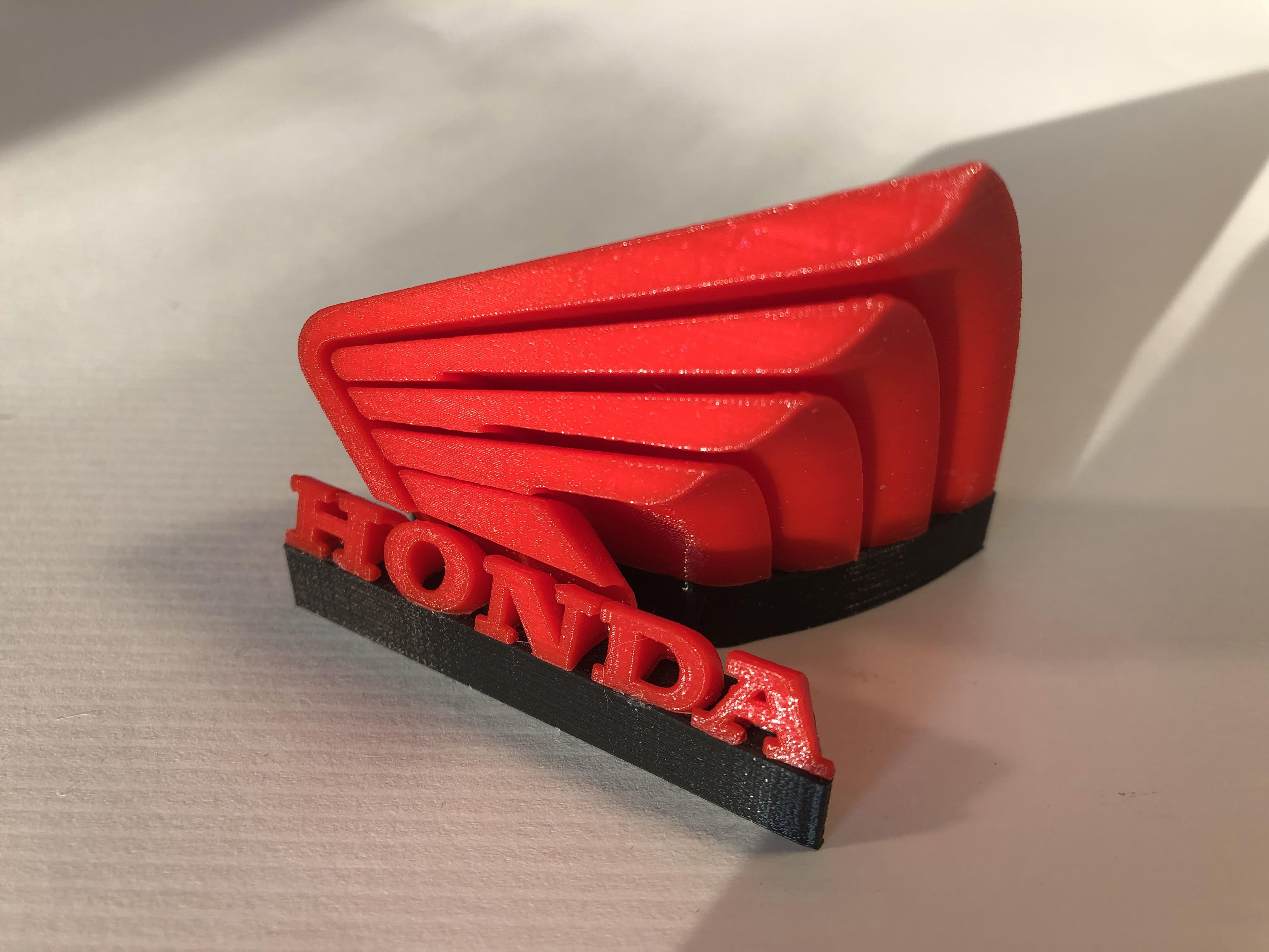 3D Printable Logo Paper Weight by Perry Koradiya