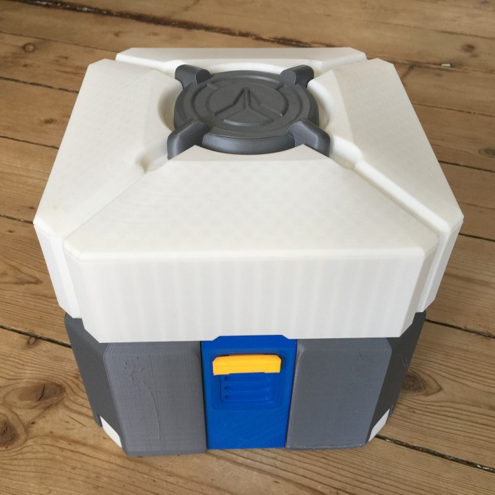 Overwatch loot box in separated colored parts image