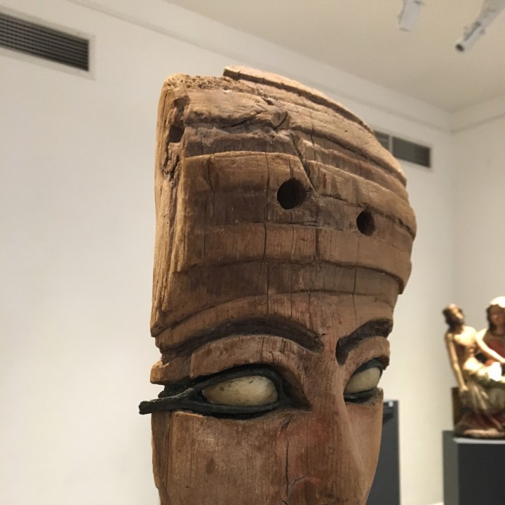 A wooden mummy mask image