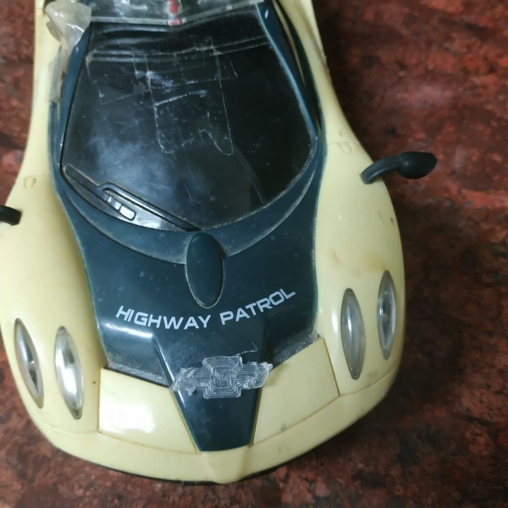 a small chevrolet logo for a rc car/ high way patrol police image