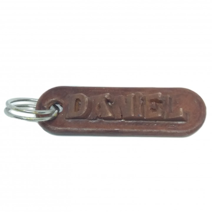 DANIEL Personalized keychain embossed letters image