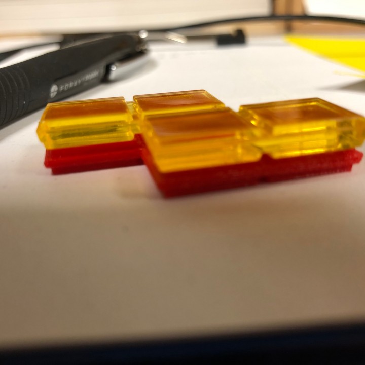 Blokus replacement piece (Yellow piece is the original) image