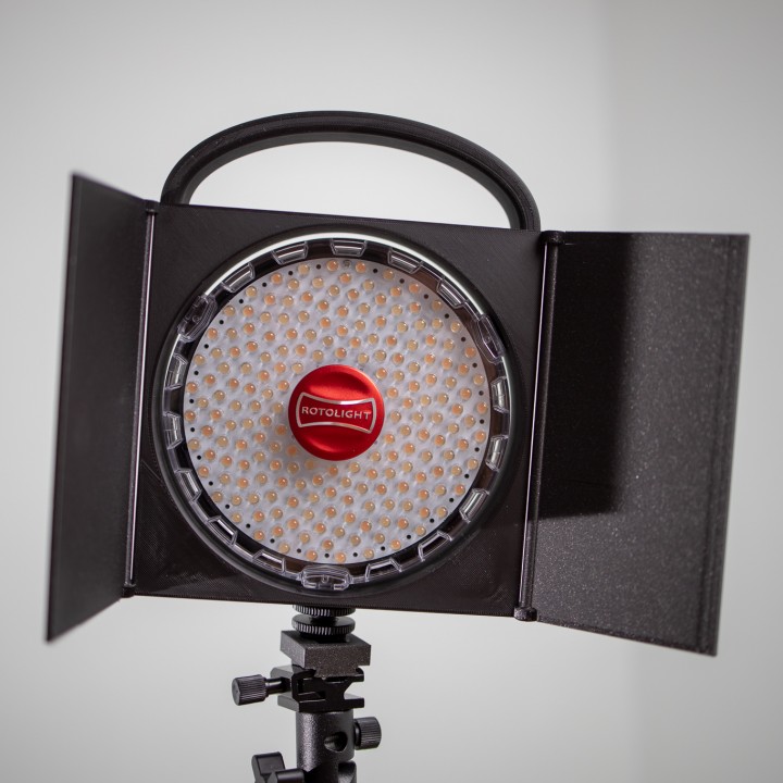 Frame to Rotolight Neo2 with handle and to barndoors. image
