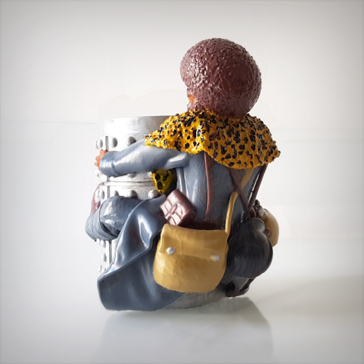 Afro pen holder. image