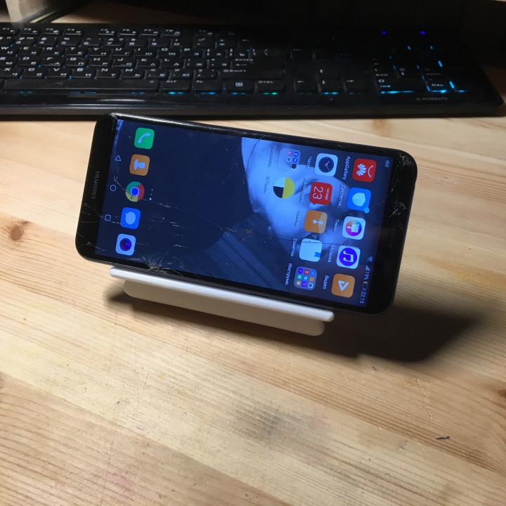Phone holder for table image