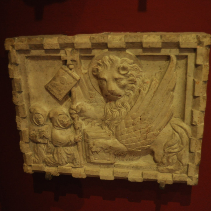 Relief with a lion image